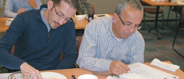 Moroccan millers Abdeslam Acharki, left, and Yahya Moussa take part in sensory testing of couscous at the Canadian International Grains Institute.  |  Ed White photo  