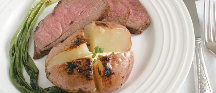 Serve Asian style flank steak with a baked potato and green vegetable.  |  Sarah Galvin photo