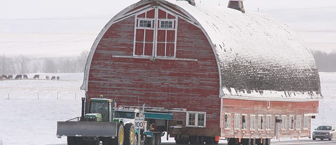 In this week's video, Barb Glen has a photo essay of a set of 100-foot-long dairy barns being moved near Pincher Creek, Alberta. | Barb Glen photo. 