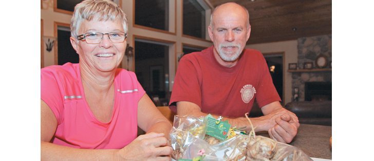 Greenridge Farm owners Emmy and David Byle are planning a marketing strategy to sell their daylily bulbs to prairie gardeners.  |  Ed White photo