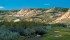 ABOVE: The Frenchman River winds its way toward the Cypress Hills. | Arlene and Robin Karpan photo