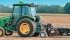 The pneumatically actuated probe can pull up to 2,500 cores per hour. After collecting the cores, the soil travels via auger to the bagging machine in the tractor cab. | Agrobotics photo