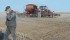 Despite the cold soil, Gord Peters and son Trent (in tractor) begin planting durum on one of their fields north of Cadillac, Sask. May 7. | William DeKay photo