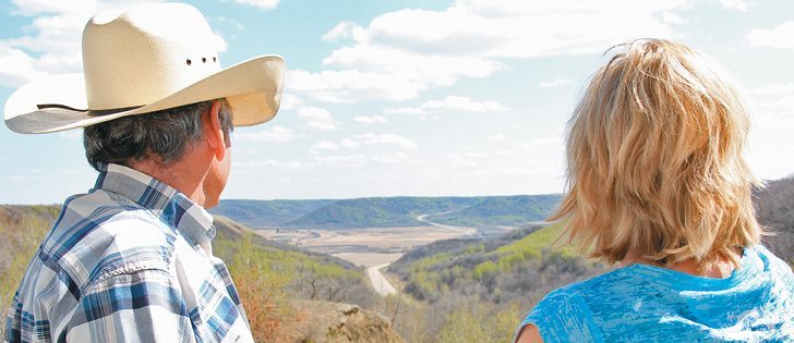The Fricks enjoy the valley view from their deck.  |  Christalee Froese photo