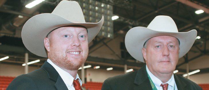 Travis Rogers, left, is the 2014 Calgary Stampede champion livestock auctioneer. He competed against 25 other auctioneers including his father, Garth Rogers.  |  Barbara Duckworth photo