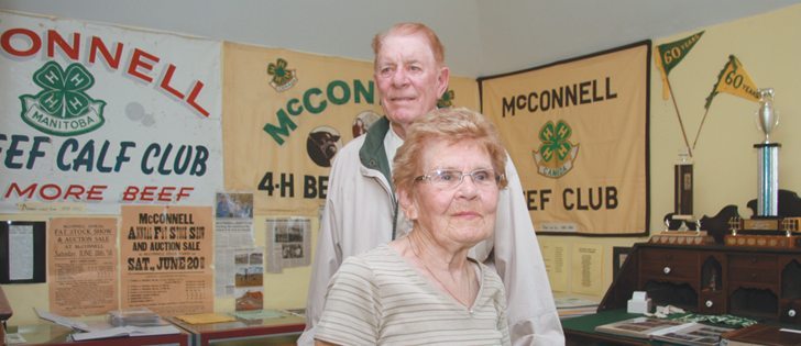 Margaret and Jack Boyd, widely regarded as the McConnell 4-H Beef Club historians, stand among a collection of 4-H memorabilia at the train station museum in Hamiota, Man.   |  Karen Morrison photo