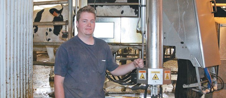 Cody Nicolay of Rocky Mountain House, Alta., bought a robotic milker as part of his succession plan. | Mary MacArthur photo