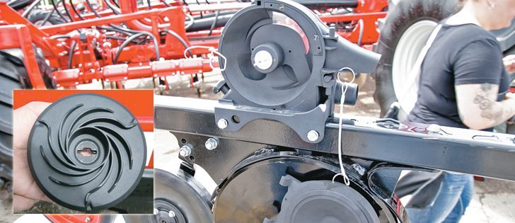 : The Horsch wheat singulator is designed to bolt onto the company’s Pronto disc drill.
INSET: The spinning movement of the rotor pushes wheat kernels to the outside of the singulator. A notch catches the seed and directs it down the chute toward the opener. | Robin Booker photo