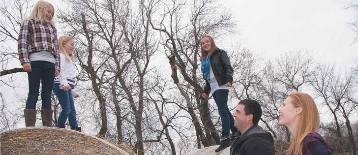 Colin Hudon, his wife, Dawn, and their daughters, Ashley, left, Jordan and Taylor, live on a quarter section near Rosser, Man.  | Robert Arnason photo