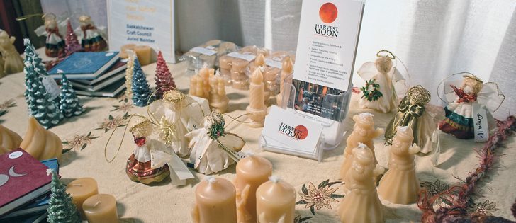 Richard Lamartine and Valerie Martin sell beeswax candles, handmade angels, wreaths, and other Christmas crafts. They support other artists through their gallery, Harvest Moon.  |  Robyn Tocker photo