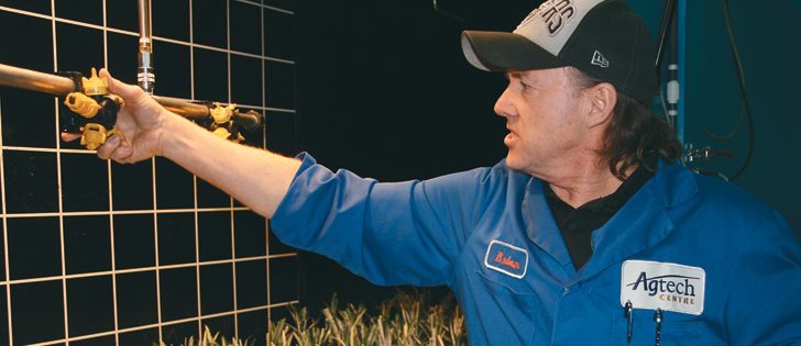 Brian Storozynsky, project manager at the Alberta Agriculture AgTech Centre in Lethbridge, demonstrates how sprayer nozzles are tested in a wind tunnel. The centre held an open house Feb. 12 to show off some of the research work it has completed or has underway.  |  Barb Glen photo