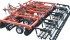 The McFarlane Incite 5000 tillage tool has a gang of adjustable Incizor discs at the front, followed by a unique cutting reel. The third row is another gang of adjustable Incizor discs, followed by the three-bar flexible tooth harrow and the rolling basket with eight flat bars. | McFarlane Manufacturing photo