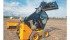 A tilting cab and large rear door offer easy access for maintenance to JCB skid and track loaders. | Michael Raine photo