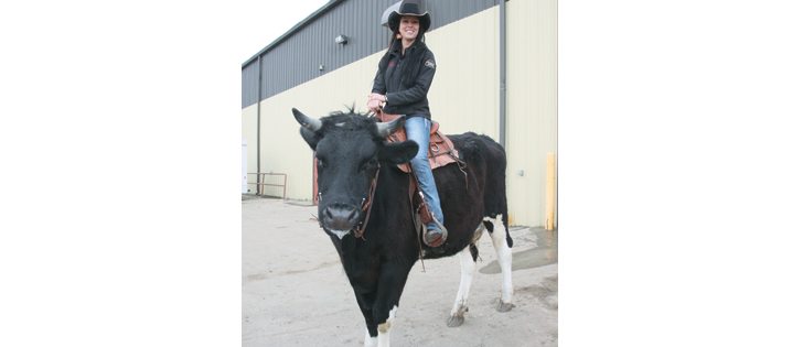 Katie Connolley of Onoway, Alta., and her three-year-old Holstein steer, Dozer, entertained at the Mane Event in Red Deer.  |  Mary MacArthur photo