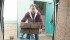 Giles Hinse of Edmonton loads boxes of day-old chicks in the back of a van for transport. | Mary MacArthur photo