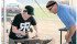 Taris Tuffs, left, takes advice from David Morch during the Chad Johnstone Memorial Farrier Competition at the recent fair in Weyburn, Sask. Tuffs
is a farrier student at Olds College and is apprenticing for the summer with Morch of Rosthern, Sask. | Karen Briere photo