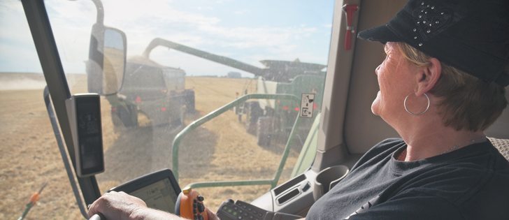 Barb Krupski has been helping neighbour Paul Smith during harvest for about 20 years near Abernethy, Sask., Aug. 20. On this day they’re harvesting barley.  |  William DeKay photo