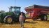 Matt Reimer's tractor and grain cart follow him everywhere he wants them to, including to the combine to pick up grain in the field. | Matt Reimer photo