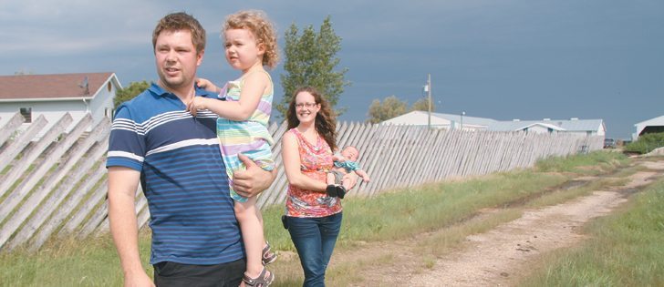 Neil Versavel, Valerie Millette and their kids, Melodie, 2, and Aiden, one month, live on 80 acres near Balmoral, Man. They are both veterinarians. Neil also raises Suffolk sheep on his parents’ farm near Stonewall, Man.  |  Robert Arnason photo