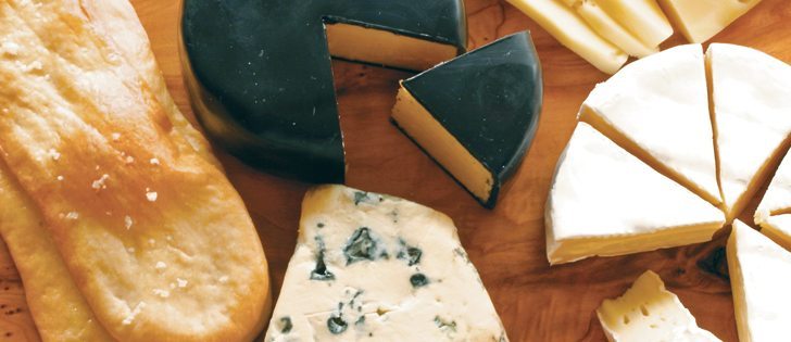 Cheeses from the top and clockwise are Danish Fontina, Brie, St. Agur and Black Bomber English Cheddar.  |  Sarah Galvin photo