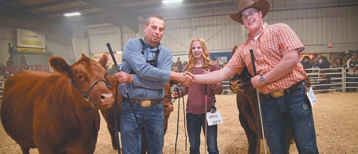 The supreme grand champion female at the Stockade Roundup in Lloydminster, Sask., was awarded to Rob Adams and his daughter, Halley, 16, of Forestburg, Alta.  |  William DeKay photo