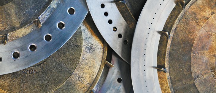Monosem vacuum planters are known for their wide variety of seed size capacities, as these different seed plates show, which can handle tiny onion seeds as well as large Kabuli chickpeas.  |  File photo