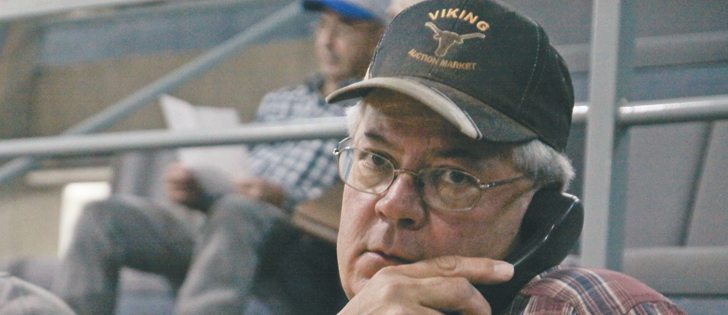 Cliff Grinde of Viking Auction Market in Viking, Alta., takes orders over the phone to buy and sell cattle.  |  Mary MacArthur photo