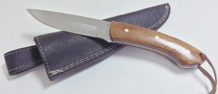 This hunting knife from Slice & Dice in Jasper, Alta., is made from stabilized wood, which prevents it from cracking when the temperature rises or falls.  |  Kim Quintin photo