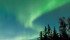 Visible aurora occur when particles in the ionosphere are struck by energetic particles that originate from the sun. These collisions generate light, making the aurora borealis.