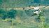 The Agras MG1 is a battery powered, eight-motor helicopter with a 2.6 gallon spray tank that rinses clean after use. | DJI photo