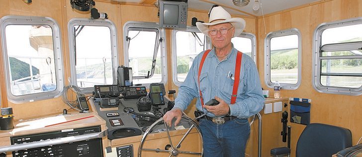 Ben Gray spends time in the boat that he and his sons sailed around the world 10 years ago.  |  File photo