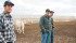 George Lohues, left, and his brothers, Mark and John, installed rolled compacted concrete flooring in six of their feedlot’s pens last summer. | File photo