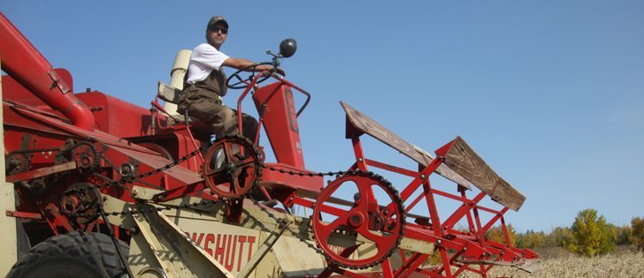 In the days when combine cabs were less comfortable or didn’t exist at all, farmers could tell what was happening by the feel and sound of the machine. | File photo