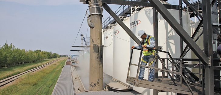 Producer car loading sites like this one in Rosalind, Alta., would be licensed by the Canadian Grain Commission under the proposal.  |  File photo
