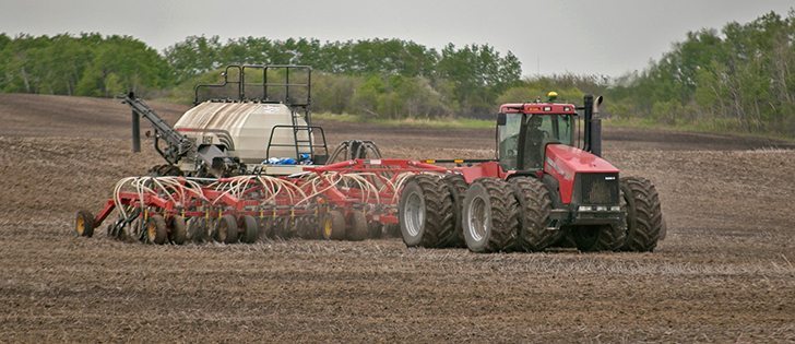 Farmers across the Prairies were rushing to beat the rain over the weekend as they put in the 2016 crop. | Robin Booker photo