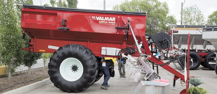 Salford’s 8611 pull-type pneumatic boom applicator has an option for a second hopper that can be used for micronutrients, micro-fertilizers, or chemicals, allowing for the application of multiple products at the same time. | Robin Booker photo