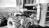 Ken Walters, who farmed near Welling, Alta., was dwarfed by Southern Star, the 50,000 pound tractor he built during the winter of 1976-77. | File photo