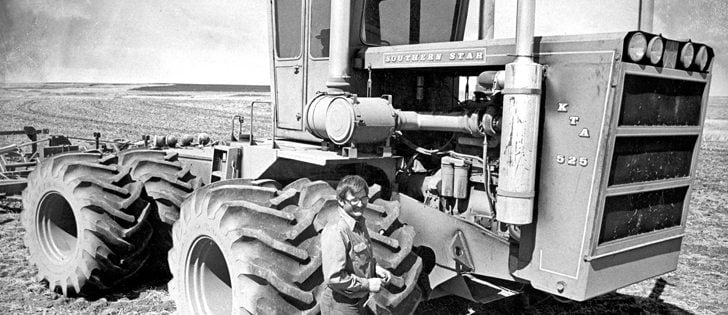Ken Walters, who farmed near Welling, Alta., was dwarfed by Southern Star, the 50,000 pound tractor he built during the winter of 1976-77.  |  File photo