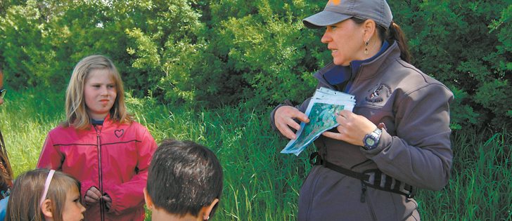 Wendy Aupers, community engagement lead for Alberta Environment and Parks, describes ways to avoid bears. She was speaking at a June 18 bear safety workshop in Beaver Mines, Alta., which was designed for Alberta ranch families who might have bears on their properties.  |  Barb Glen photo