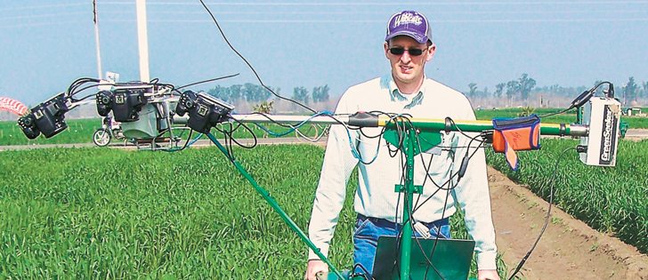 Using the multi-sensor PhenoCart, plant breeders like Jared Crain can collect data within an hour that would otherwise take days to collect.  | Uttam Kumar photo