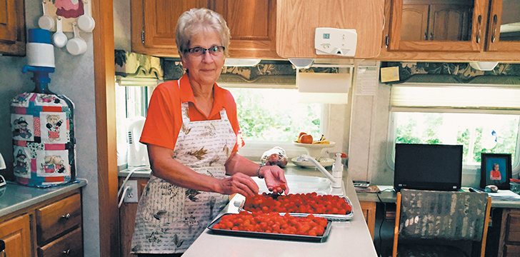 Elaine Halvorson and her husband, Melvin, have travelled the North American continent in their RV. Elaine, who has adapted to working in a small RV kitchen, gets ready to make jam. |  Shirley Byers photo