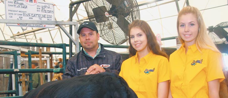 Scott Tibble and his daughters, Robyn and  Martina, participated in Summer Synergy at Olds, Alta., in July where they showed purebred Black Angus cattle.  |  Barbara Duckworth photo