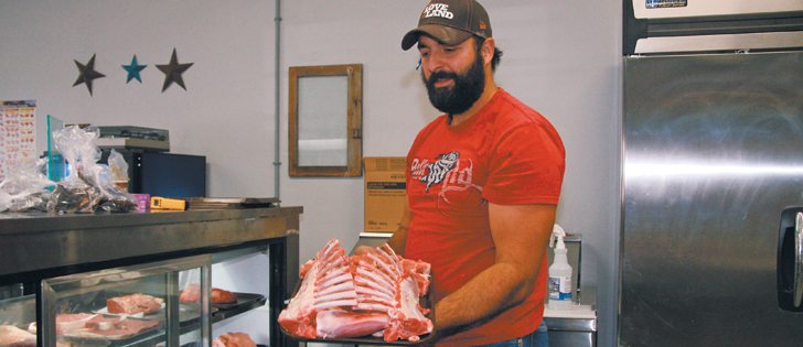 Brian Mendieta shows off cuts of meat at his Westlock Butcher Shop in Westlock, Alta. | Karen Morrison photo