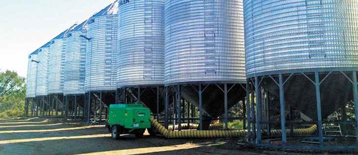 The friction fired dryers move easily from bin to bin. Ducting can feed more than one bin at a time.   |  Kevin Baker photo