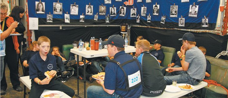 4-H members take a break for lunch during the 4-H on Parade event in Calgary in June. The Alberta program will turn 100 next year and plans are being made to celebrate the centennial.  |  Karen Morrison photo