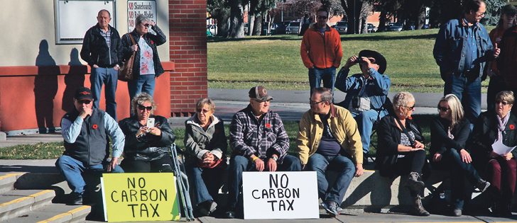 Some expressed their views with placards as about 300 people gathered in Lethbridge to protest Alberta’s carbon tax. A calm 20 C day made it easy to sit and listen to speakers for two hours.
|  Barb Glen photo