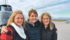 Angie Fox, left, Maggie Van Camp and and Kristy Heimstra pose after a helicopter ride over Niagara Falls that was sold in a charity auction at the OYF event in memory of VanCamp and Fox’s husbands and Heimstra’s son, Jaron. | Maggie Van Camp photo