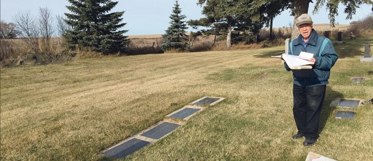 Pilot Mound resident George Gilmour managed to figure out where John Walker’s grave should be using a map and book with plot numbers connected to names.  |  Ed White photo