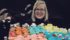 There were 100 cupcakes to mark 100 years of 4-H in Alberta during a Jan. 7 celebration among 4-H clubs in Lethbridge. Ruth Sprague of the Brooks and Area 4-H Multi Club stands behind the treats. | Barb Glen photo