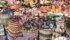 Masks, bags and scarves in a rainbow of colours are for sale in the Antigua market. | Arlene & Robin Karpan photo